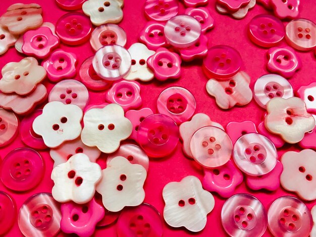 Photo assortiment de boutons roses