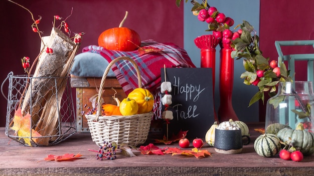 Automne nature morte avec citrouilles et plaids