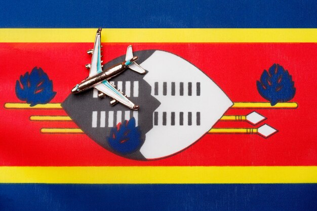 Photo avion au-dessus du drapeau du concept de voyage et de tourisme du swaziland