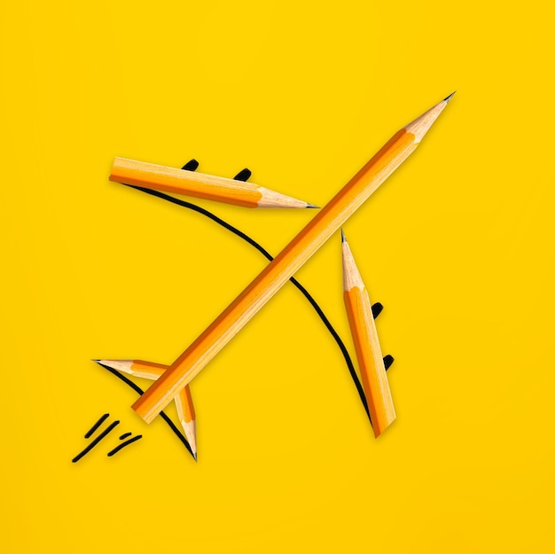 Avion fabriqué à partir de crayons en bois sur fond jaune illustration de concept créatif