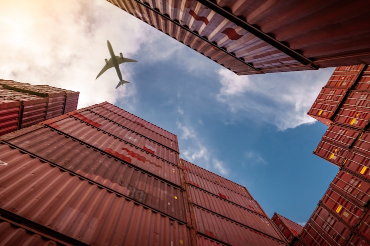 Photo avion volant au-dessus de la logistique des conteneurs.