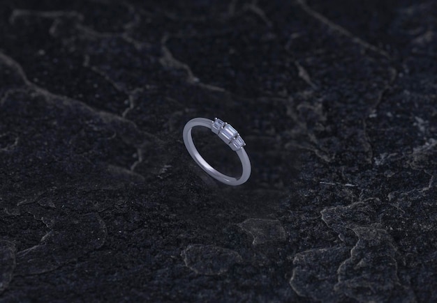 Bague en argent sterling sur fond de pierre noire