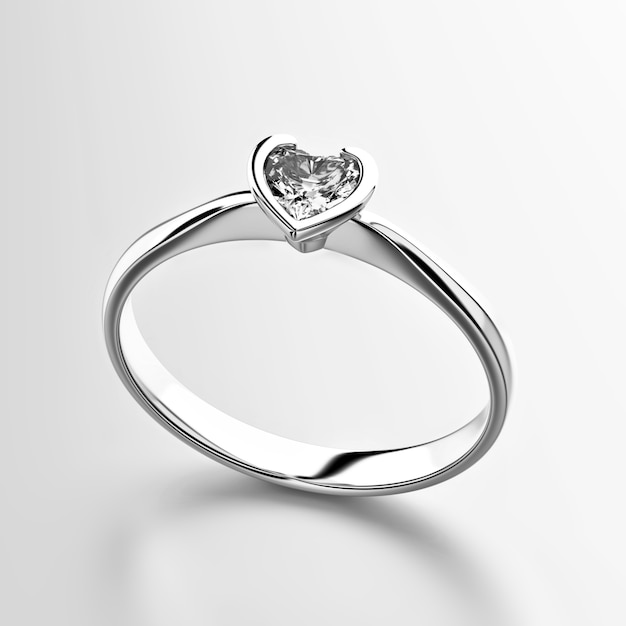 Bague en diamant en forme de coeur isolé sur fond blanc