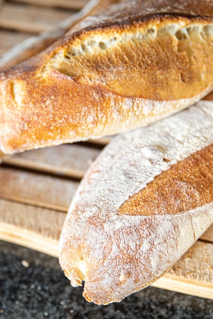 baguette pain français repas frais collation alimentaire sur la table espace copie arrière-plan alimentaire rustique