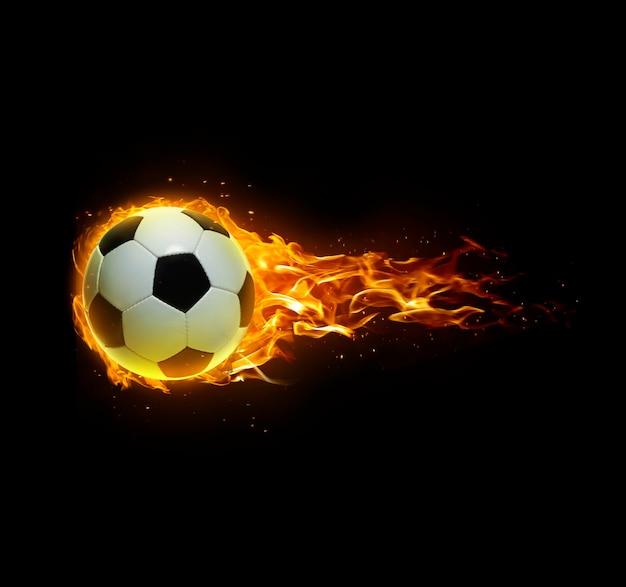 Une balle de football en feu sur fond noir