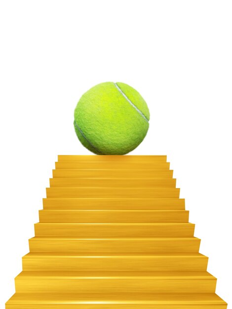 La balle de tennis placée sur l'escalier de couleur or