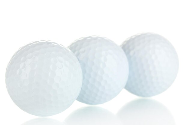 Photo balles de golf isolées sur blanc