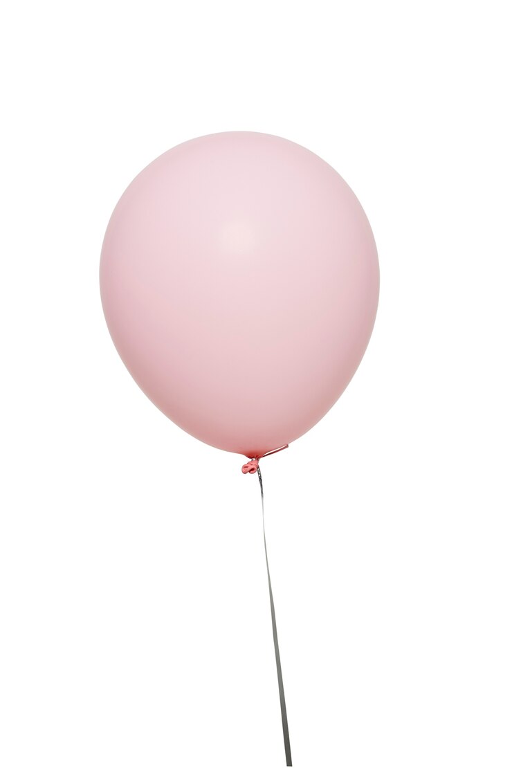 Photo ballon blanc flottant sur blanc