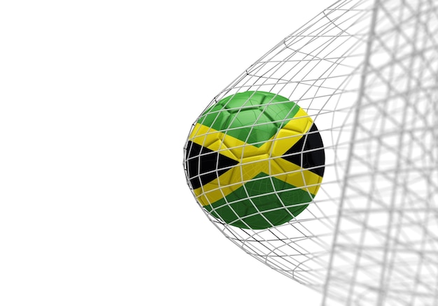 Le ballon de football de drapeau de la Jamaïque marque un but dans un filet