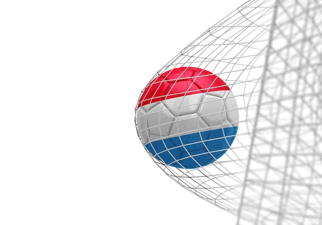 Le ballon de football de drapeau luxembourgeois marque un but dans un filet