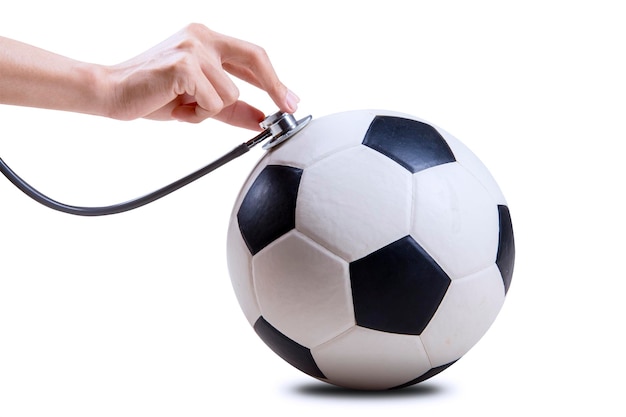 Ballon de football avec main et stéthoscope