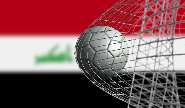 Le ballon de football marque un but dans un filet contre le rendu 3D du drapeau de l'Irak