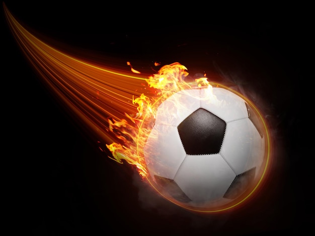 Le ballon de football vole avec des effets magiques rapides comme l'éclair dans une flamme orange futuriste affichant un fond noir