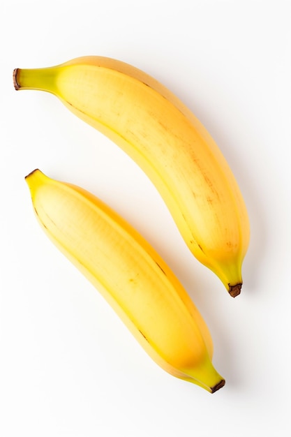 Banane avec un fond blanc isolé mettant en évidence le fruit mûr dans sa plénitude Banane jaune