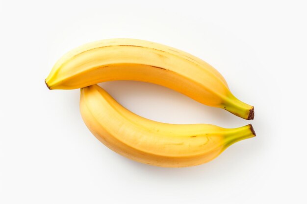 Banane avec un fond blanc isolé mettant en évidence le fruit mûr dans sa plénitude Banane jaune