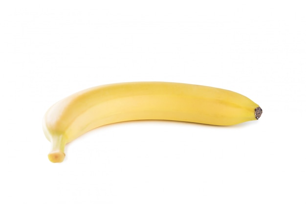 Une banane sur une surface blanche