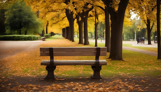 Photo un banc de parc avec un arbre jaune en arrière-plan