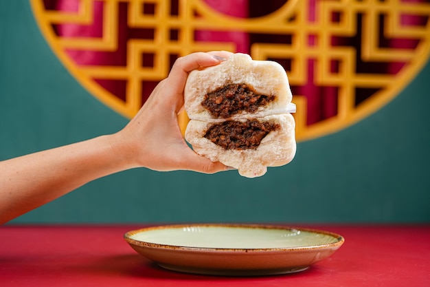 Photo baozi ou bakpao est un type de pain rempli de levure dans diverses cuisines chinoises