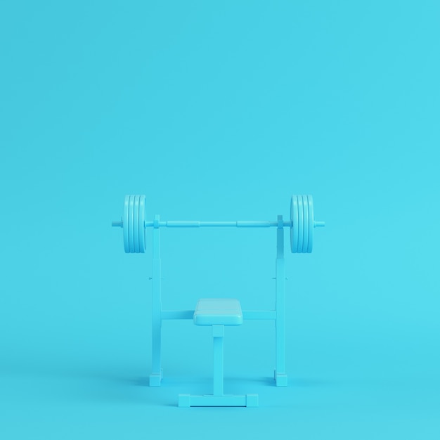 Barbell avec banc sur fond bleu vif