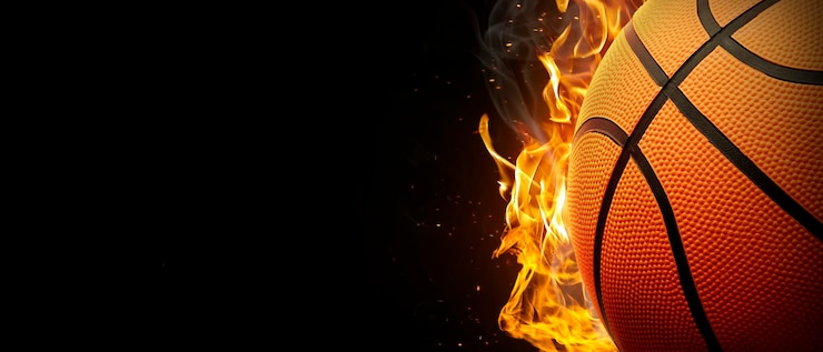Photo basket-ball en feu sur fond noir