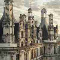 Photo bâtiment d'architecture de la renaissance de chambord avec une icône d'horloge