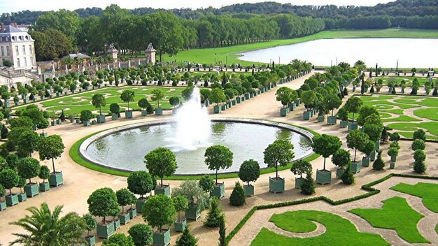 Photo bâtiment château fontaine france jardin à la française palais