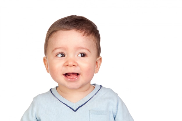 Beau bébé avec de beaux yeux isolé sur fond blanc