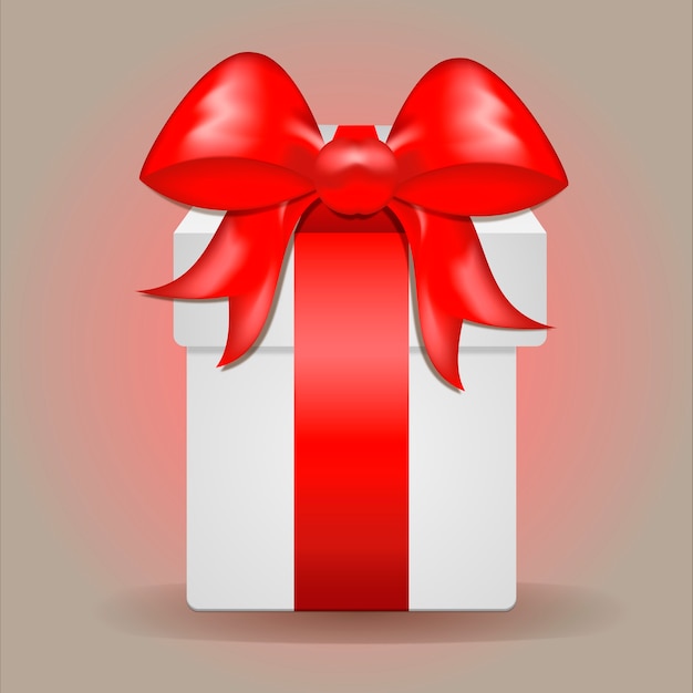 Beau coffret cadeau festif, avec ruban de satin rouge, sur fond dégradé clair. Concept de vacances.