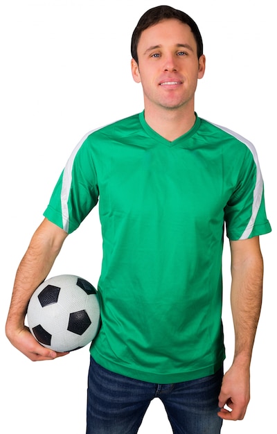 Beau fan de football en vert