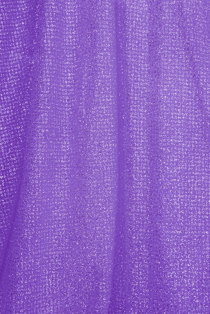 Beaux plis de tissu violet brillant. Texture textile.