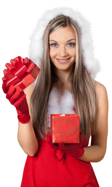 Photo belle femme blonde en bonnet de noel avec cadeau