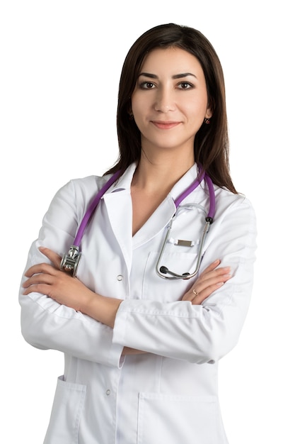 Belle femme médecin souriant avec les mains jointes. Concept de soins de santé et de médecine