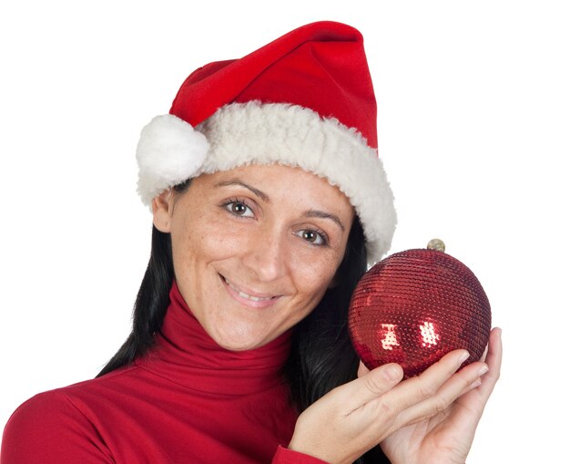 Belle fille avec un chapeau de Noël sur fond blanc