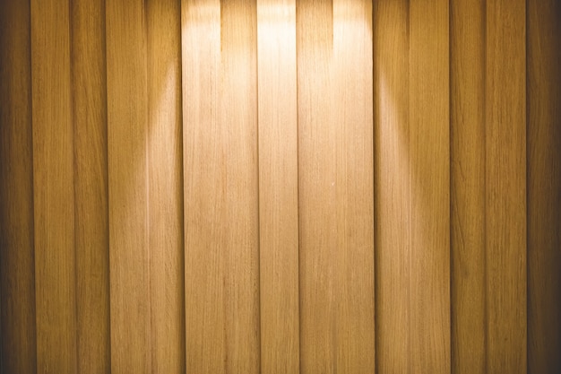 Belle image de fond d'un mur en bois avec downlights.