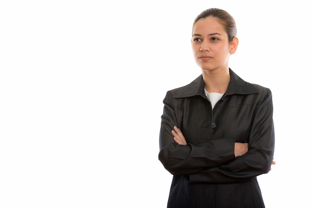 belle jeune femme d'affaires pensant avec les bras