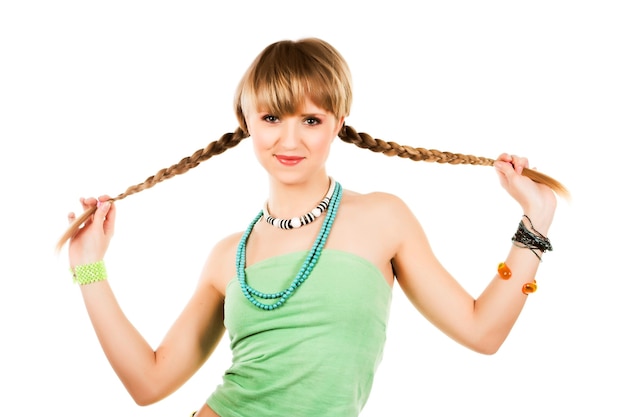 Belle jeune fille avec des tresses