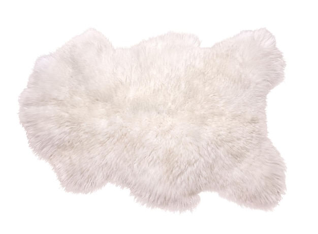 Belle peau de mouton blanche isolée sur fond blanc Tapis chaud