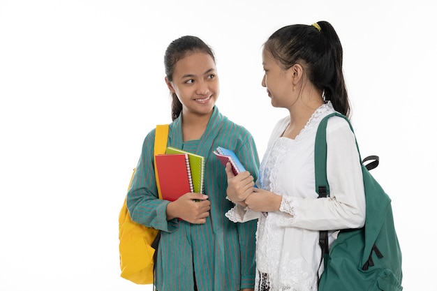 Photo belles jeunes filles sur fond blanc