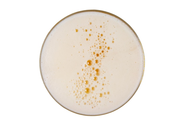 Photo bière en verre mousse de bière avec bulle vue d'en haut