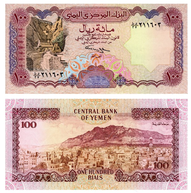 Photo un billet de la banque centrale du yémen montre une montagne et les mots banque centrale du yémen