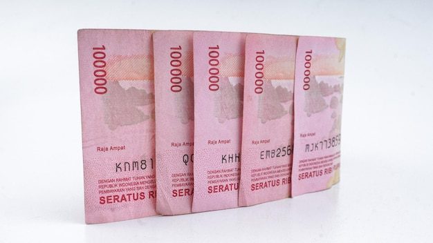 Billet plié Indonésie Argent Rupiah 100000 IDR Indonésie Monnaie Fond Argent Indonésie