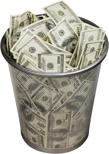 billets d'un dollar dans une poubelle