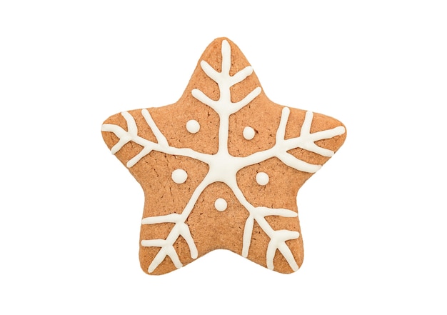 Biscuit de pain d'épice d'étoile de Noël isolé sur fond blanc