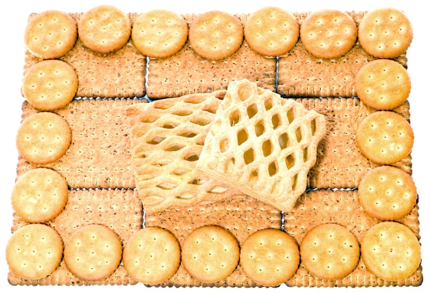 Photo biscuits de blé et biscuits fendus sur le dessus (composition des aliments, arrière-plan)