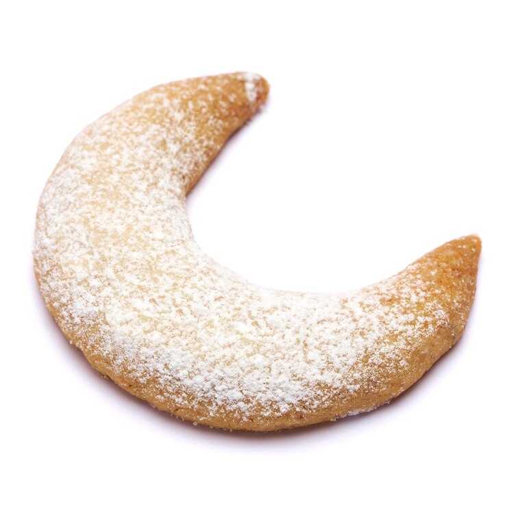 Photo biscuits kipferl à la vanille traditionnels allemands ou autrichiens vanillekipferl isolés sur fond blanc. photo de haute qualité