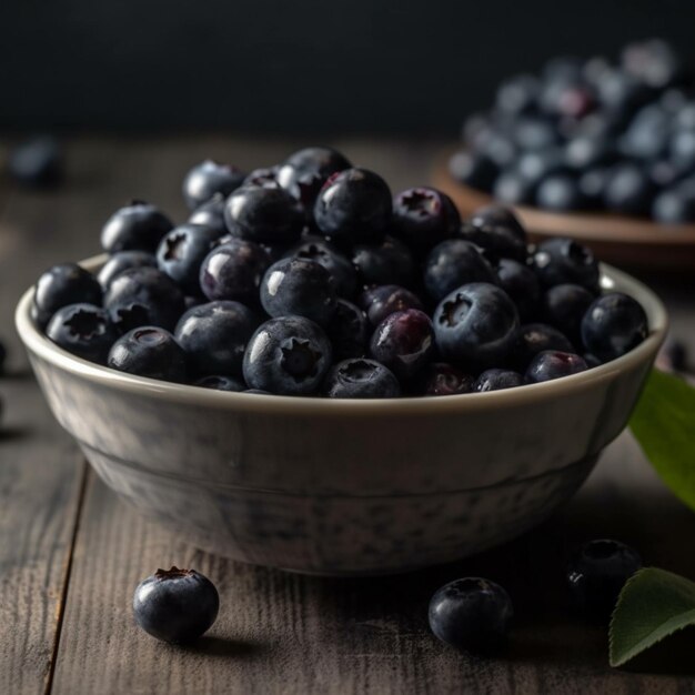 Bleuets dans un bol sur une table en bois