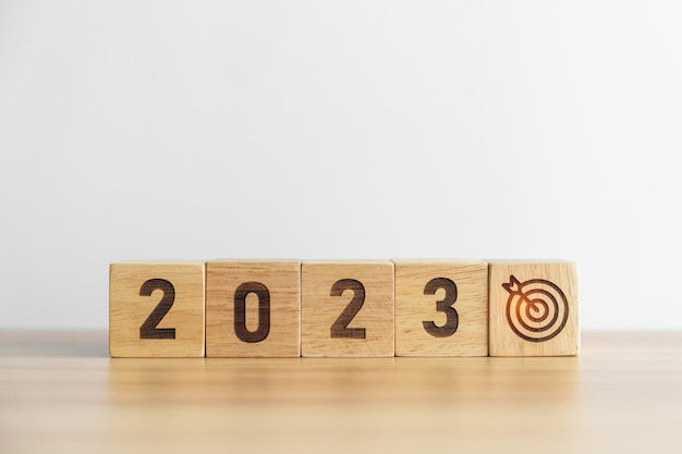Bloc 2023 avec icône de jeu de fléchettes Plan stratégique de résolution de la cible d'action Motivation de la mission d'action et concepts de début du Nouvel An
