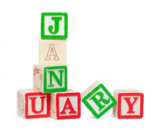 Blocs d'alphabet en bois isolés sur blanc