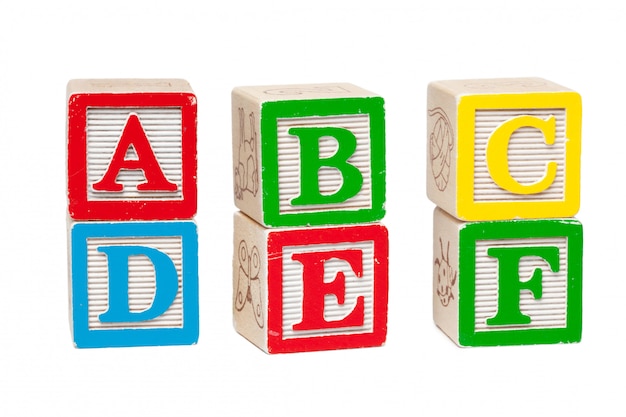 Photo blocs d'alphabet en bois isolés sur blanc