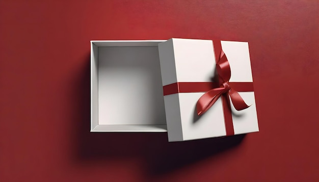 boîte cadeau blanche avec ruban rouge